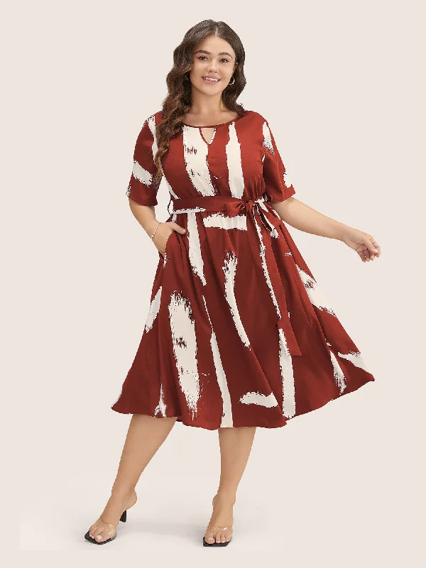 Midi dresses with pleated bodices for a classic and tailored look Brush Print Keyhole Belted Pocket Flutter Dress Midi dresses with pleated bodices for a classic and tailored look Brush Print Keyhole Belted Pocket Flutter Dress