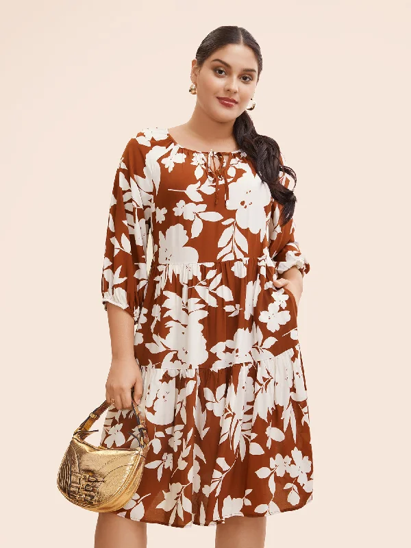 Midi dresses with fringe details for a fun and energetic style Silhouette Floral Print Knot Neck Lantern Sleeve Dress Midi dresses with fringe details for a fun and energetic style Silhouette Floral Print Knot Neck Lantern Sleeve Dress