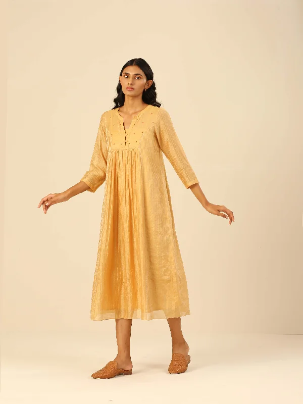Midi dresses with tiered skirts for a bohemian festival look Sunflower Gathered Midi Dress Midi dresses with tiered skirts for a bohemian festival look Sunflower Gathered Midi Dress