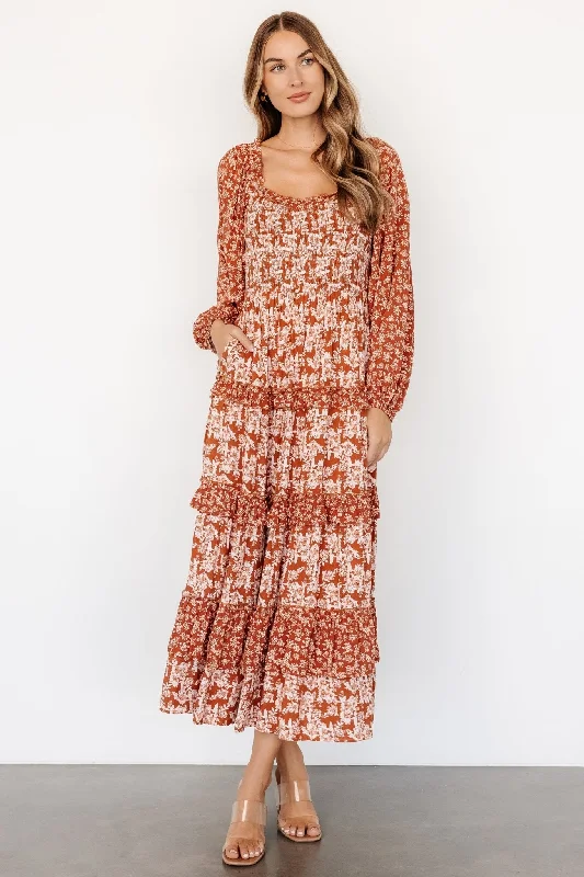 Midi dresses with bow accents for a sweet and charming look Dynah Tiered Dress | Rust +Cream Floral Midi dresses with bow accents for a sweet and charming look Dynah Tiered Dress | Rust +Cream Floral