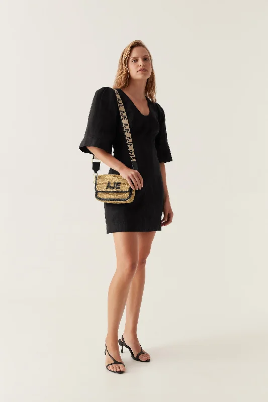 Satin mini dresses for a luxurious feel Hunter Twisted Mini Dress