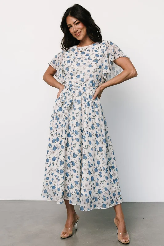 Midi dresses with asymmetric hems for a fashion - forward and dynamic appearance Laurel Midi Dress | Off-White + Blue Floral Midi dresses with asymmetric hems for a fashion - forward and dynamic appearance Laurel Midi Dress | Off-White + Blue Floral