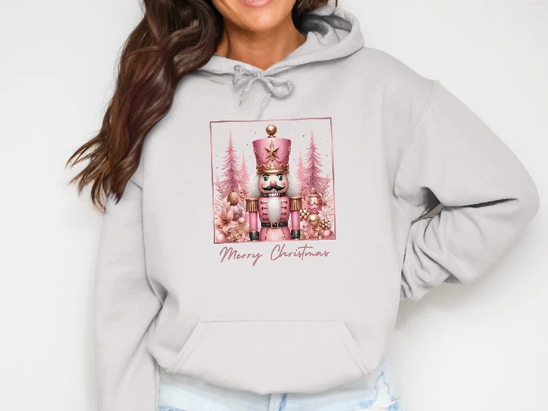 Women's hoodie with a kangaroo pocket and a pom - pom drawstring for added charmPink Nutcracker Cotton Hoodie Women's hoodie with a kangaroo pocket and a pom - pom drawstring for added charmPink Nutcracker Cotton Hoodie