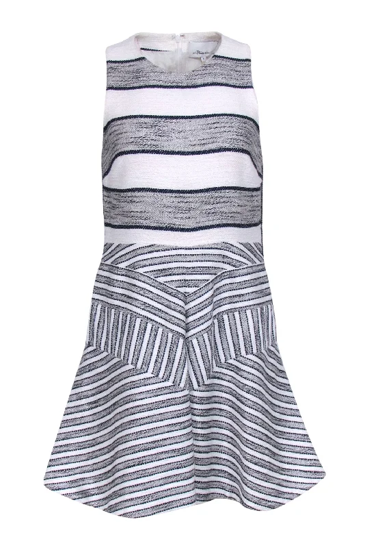 Maxi Women Dress with Floral Print for a Bohemian Vibe Maxi Women Dress with Floral Print for a Bohemian Vibe 3.1 Phillip Lim - Ivory, Navy, & Black Sleeveless Dress Sz 6