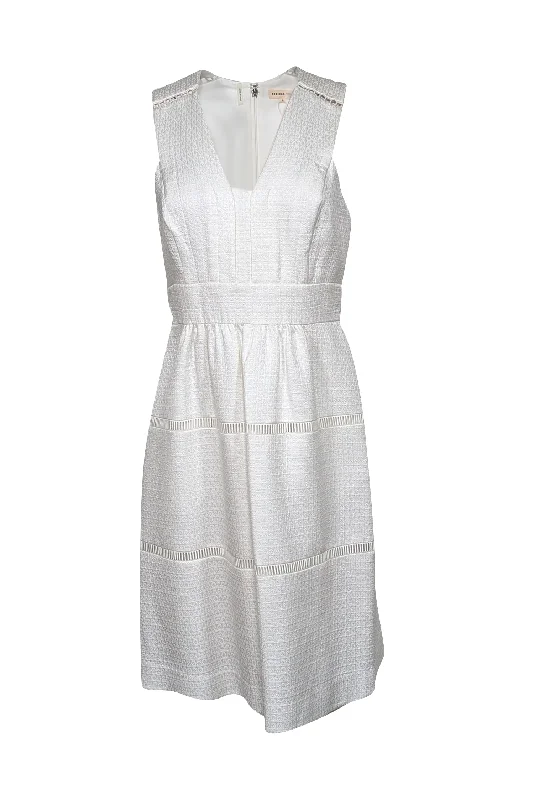 Printed Abstract Women Dress for a Modern and Artistic Appeal Printed Abstract Women Dress for a Modern and Artistic Appeal Rebecca Taylor - White Sleeveless Jacquard V-Neckline Dress Sz 8
