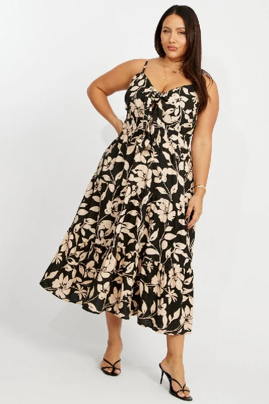 Maxi - inspired midi dresses with flowing fabrics for a beachy vibeBlack Floral Midi Dress Sleeveless Front Tie Maxi - inspired midi dresses with flowing fabrics for a beachy vibeBlack Floral Midi Dress Sleeveless Front Tie