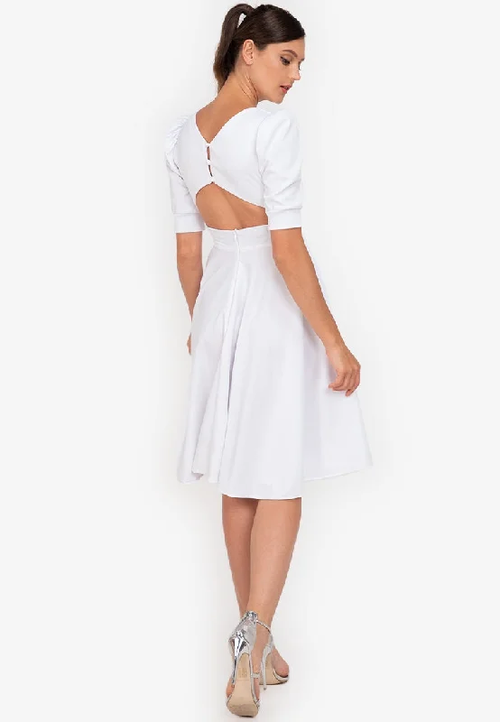 Maxi - inspired midi dresses with flowing fabrics for a beachy vibeMarsha