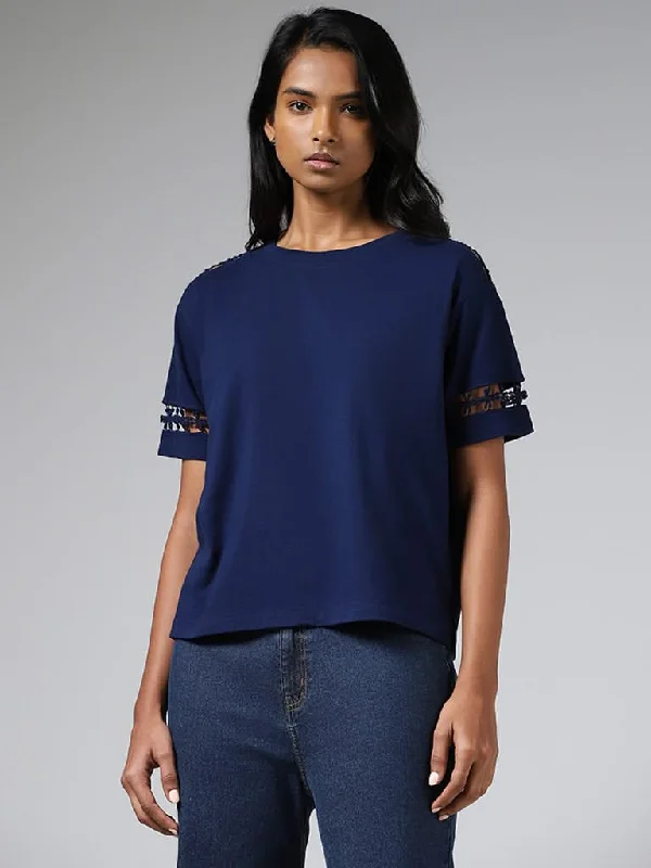 Women's pants for cocktail parties Distressed women jeans for a trendy and edgy look LOV Navy Cotton Lace Insert Top