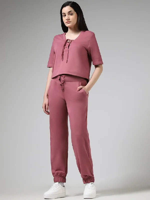 Women's junior - sized denim pants Distressed women jeans for a trendy and edgy look Superstar Solid Rose Pink Cotton Lace-Up Joggers Women's junior - sized denim pants Distressed women jeans for a trendy and edgy look Superstar Solid Rose Pink Cotton Lace-Up Joggers