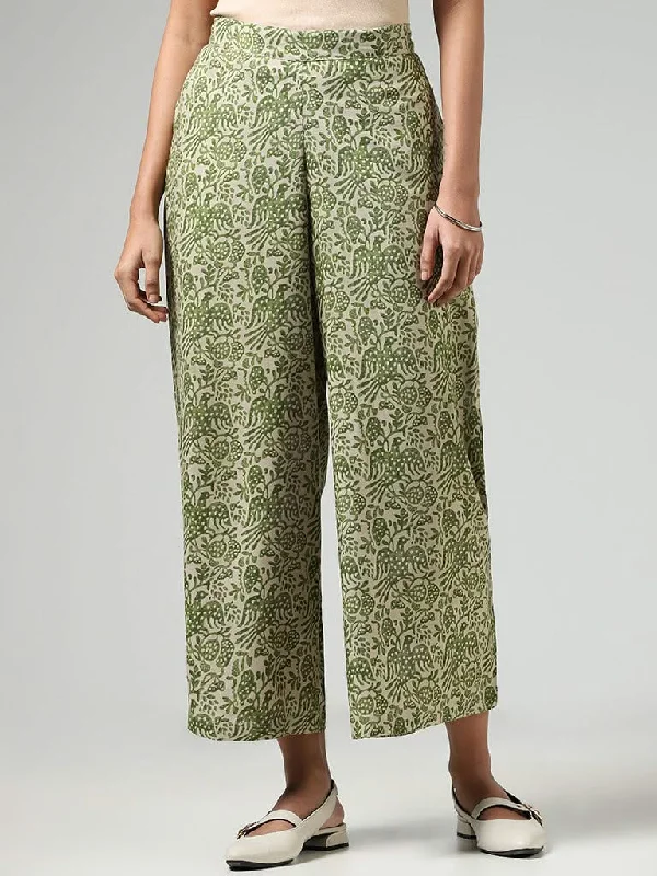 Women's flared office pants Ripped women jeans for a rebellious and fashion - forward style Utsa Olive Nature Printed Palazzos Women's flared office pants Ripped women jeans for a rebellious and fashion - forward style Utsa Olive Nature Printed Palazzos