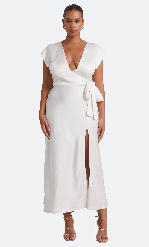 Maxi dresses with cold - shoulder cutouts for a trendy lookTHE DREAMER WRAP DRESS - IVORY Maxi dresses with cold - shoulder cutouts for a trendy lookTHE DREAMER WRAP DRESS - IVORY